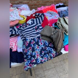 Beautiful dress for 2year old girl. Includes boots for same age.